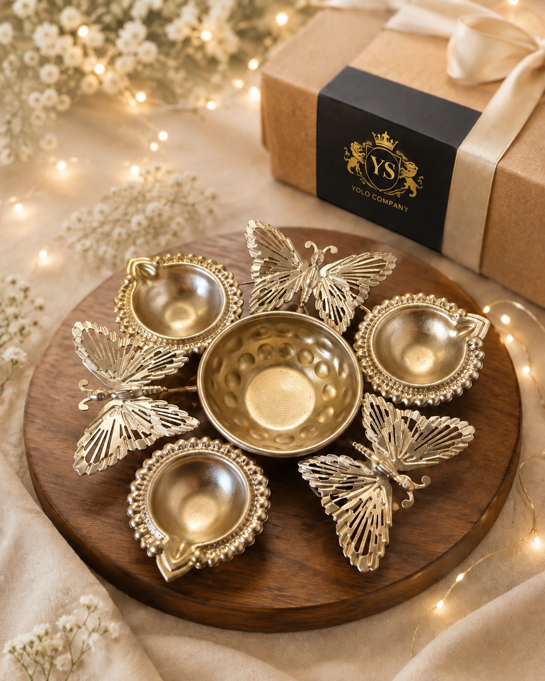 Butterfly three-diya tealight holder styled as a festive gift on a wooden board