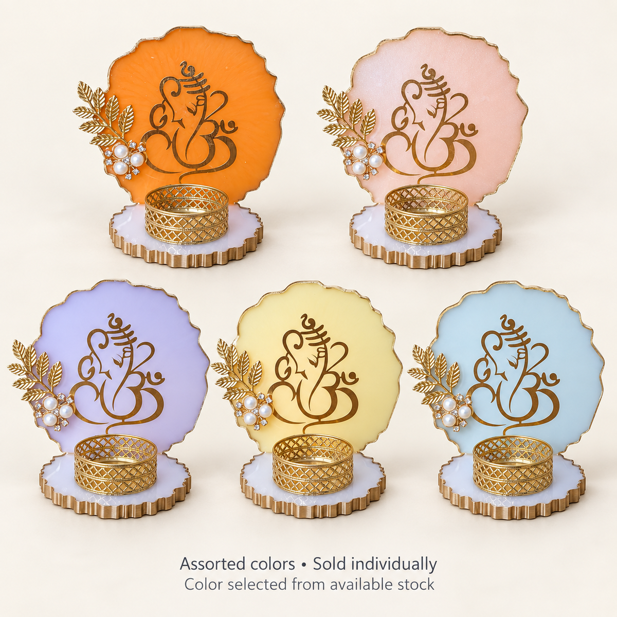 Assorted Ganesha holders in orange, pink, purple, yellow and blue; sold individually, color selected from stock