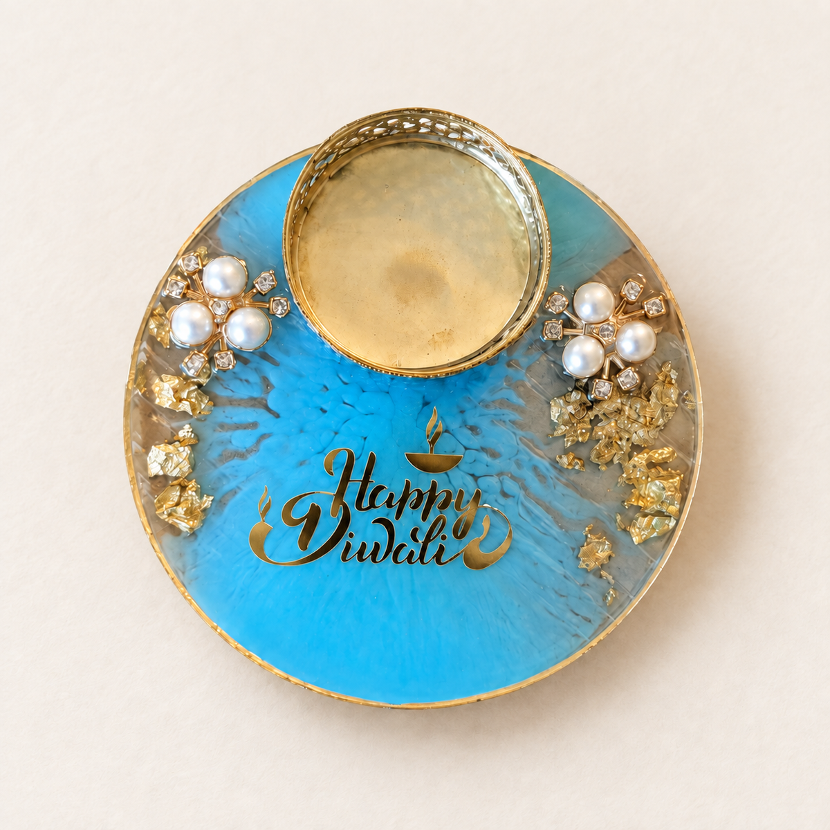blue resin tealight holder with readable Happy Diwali gold-tone inscription