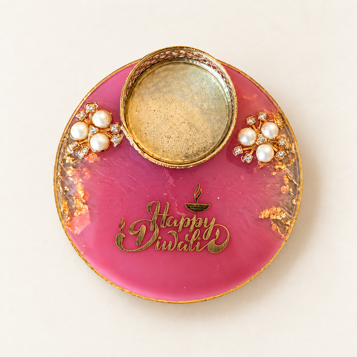 pink resin tealight holder with readable Happy Diwali gold-tone inscription