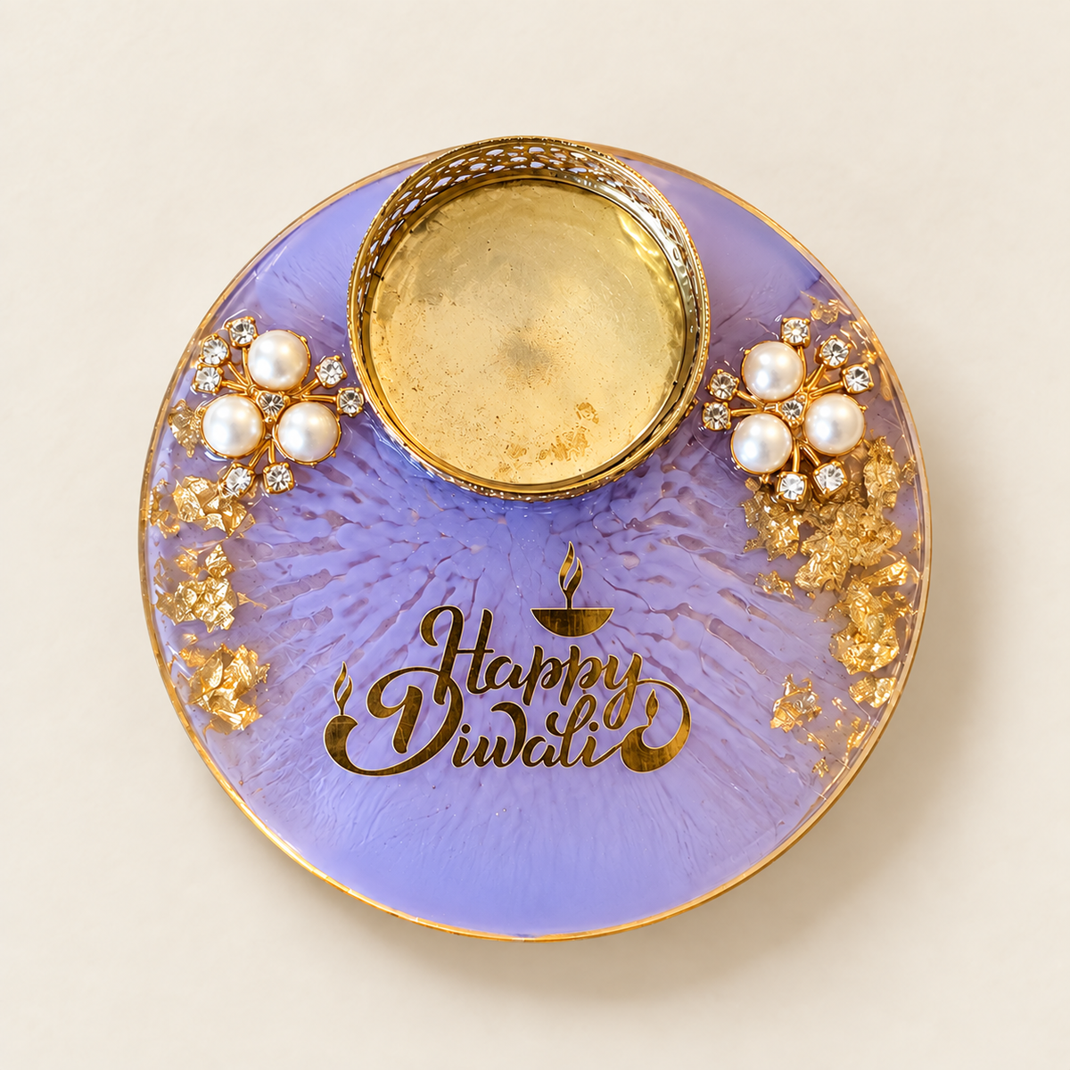 Purple resin tealight holder with readable Happy Diwali gold-tone inscription