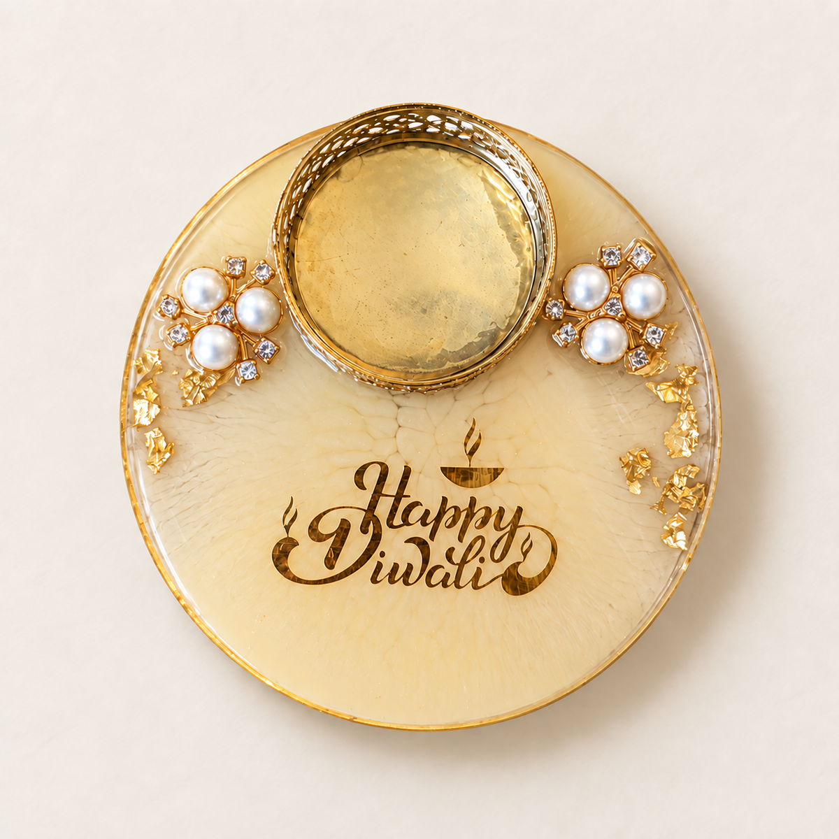 Soft yellow resin tealight holder with readable Happy Diwali gold-tone inscription