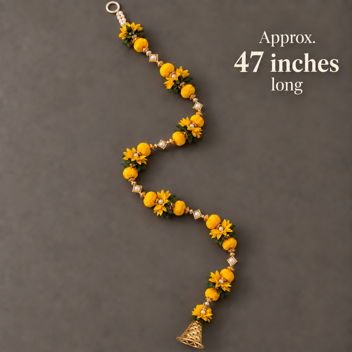 Yellow floral hanging with flared openwork gold bell, approximately 47 inches long